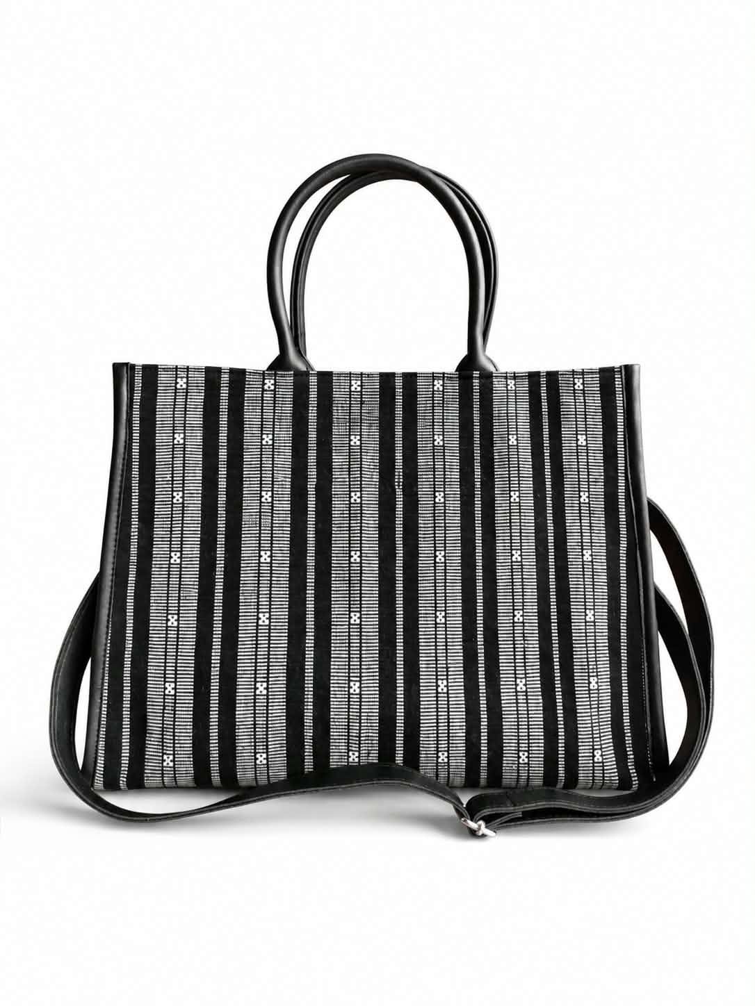 Black Ambahan woven bag with its shoulder strap